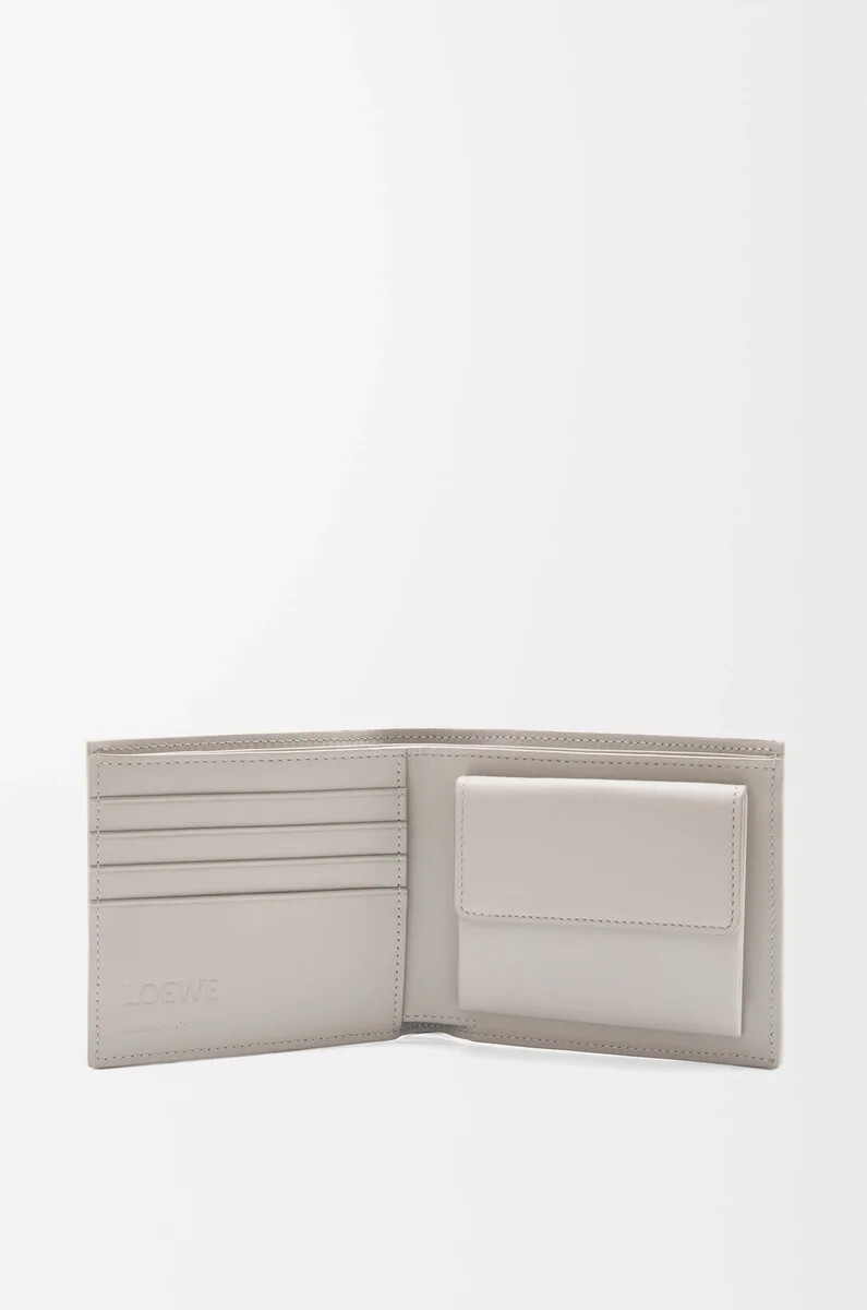 monedero plegable en piel de becerro clásica texturizada color gris concha