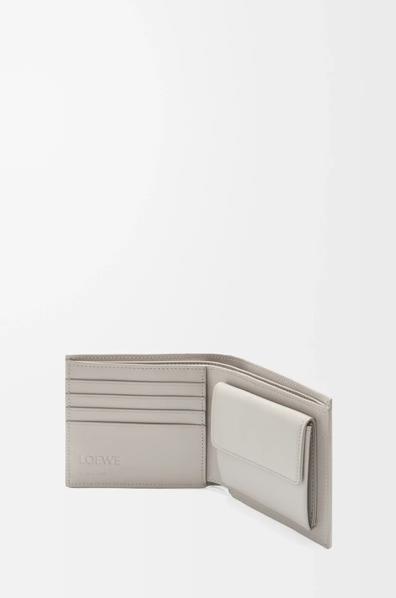 monedero plegable en piel de becerro clásica texturizada color gris concha