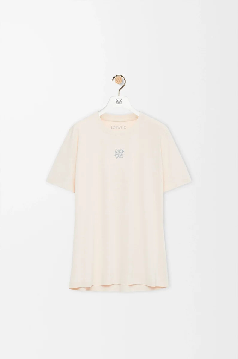 camiseta deportiva de punto técnico color marfil