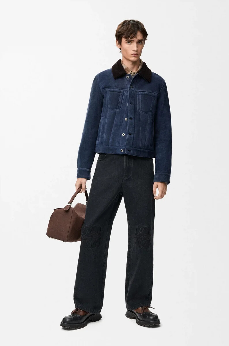 vaqueros holgados con anagrama en denim negro