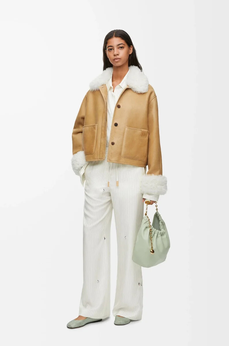chaqueta de piel de oveja blancadorada