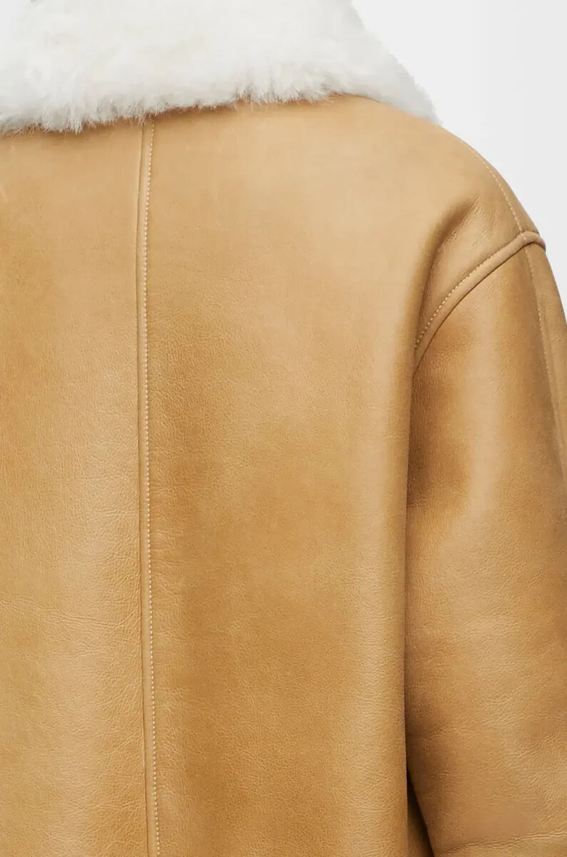 chaqueta de piel de oveja blancadorada