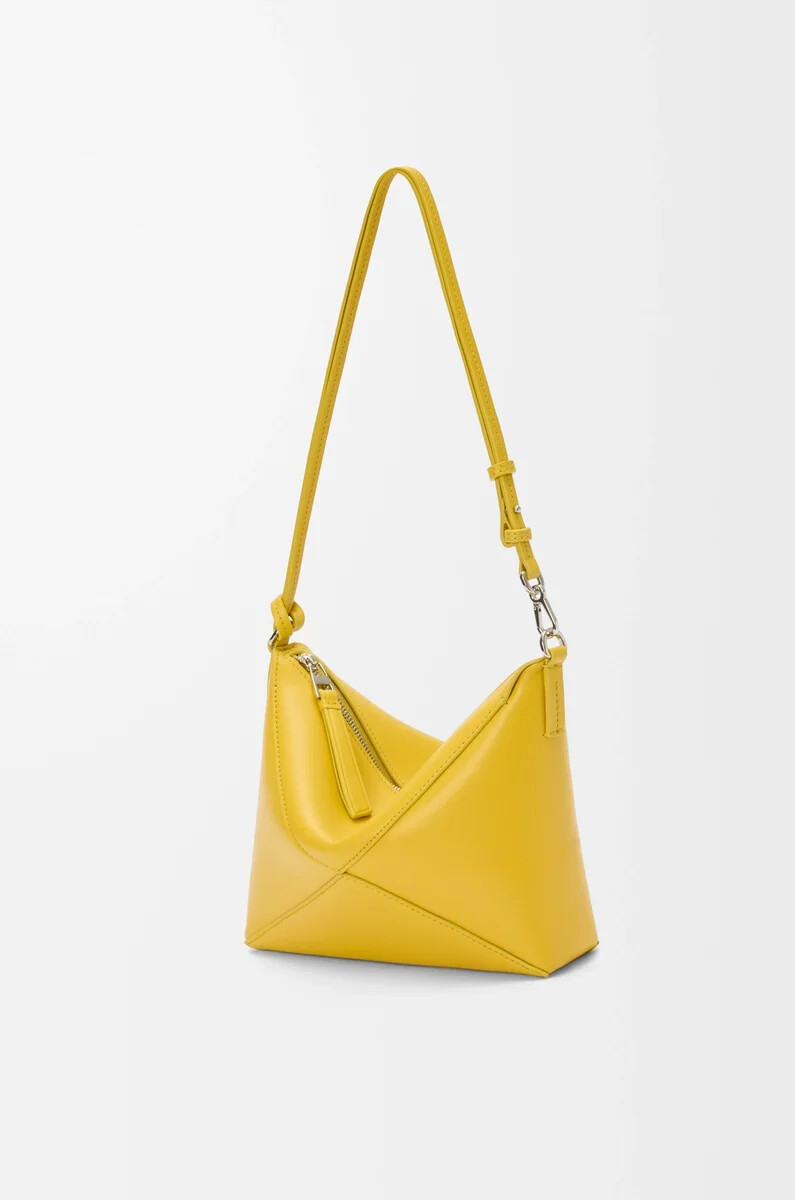 bolso puzzle fold en piel de becerro napa brillante dandelion