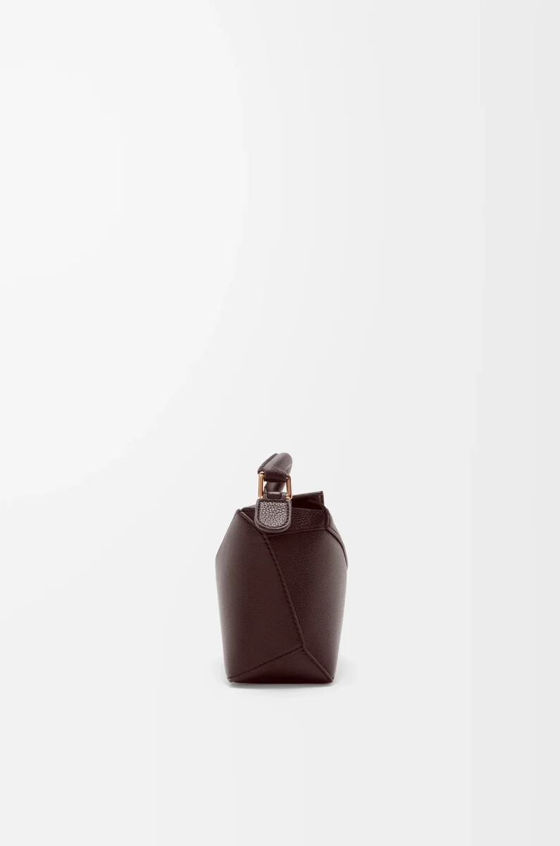 bolso mini puzzle edge en piel de becerro granulada suave color castaño oscuro