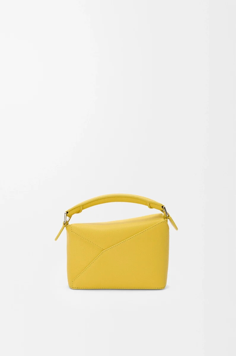 bolso mini puzzle edge en piel de becerro granulada suave diente de león