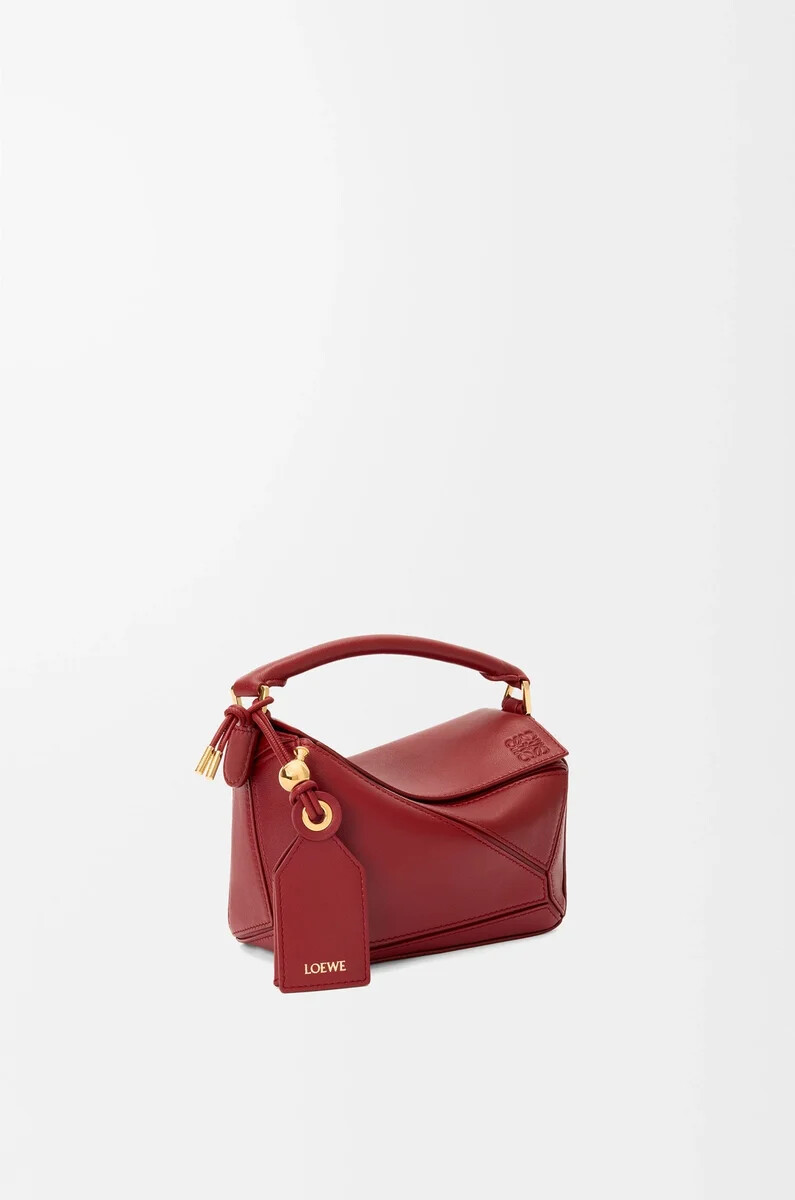 bolso mini featherlight puzzle en piel de cordero napa color rojo quemado